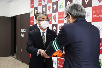 ロータリークラブ永森会長(写真左)